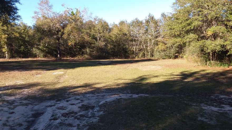 Your chance to own a little over 2 acres in the Baker area. The property is located on a quiet street at the end ofa long driveway. This lot previously had a mobile home, which is no longer on the property. Impact fees were originally paid, septic tank tap and system is already in place. The property has a well pump water system. Power pole is already installed. All of the hard work is finished, bring your RV or move in a new mobile home and you're ready to go.