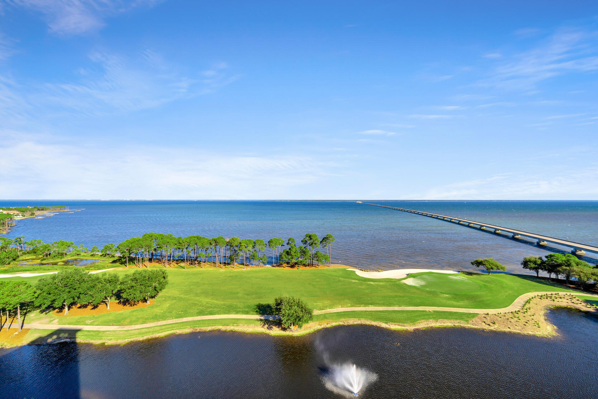 Indulge in the splendor of Bayfront living at Unit 1404, One Water Place, in the gated community of Kelly Plantation. Newly painted walls and updated designer lighting create an elegant and airy feel to this beautiful 3 bedroom residence. Detailed luxury walk in closets emphasize organization and make it easy to get ready for the day. Incredible panoramic scenes of the Choctawhatchee Bay from the multiple balconies and most of the rooms of the condo, offer the perfect ambiance to relax or entertain family and friends. The turquoise backsplash in the kitchen highlights these idealic water views. Your private elevator opens directly into the condo, ensuring a seamless and exclusive entry experience. This unit comes with the two best assigned parking spots in the condo.