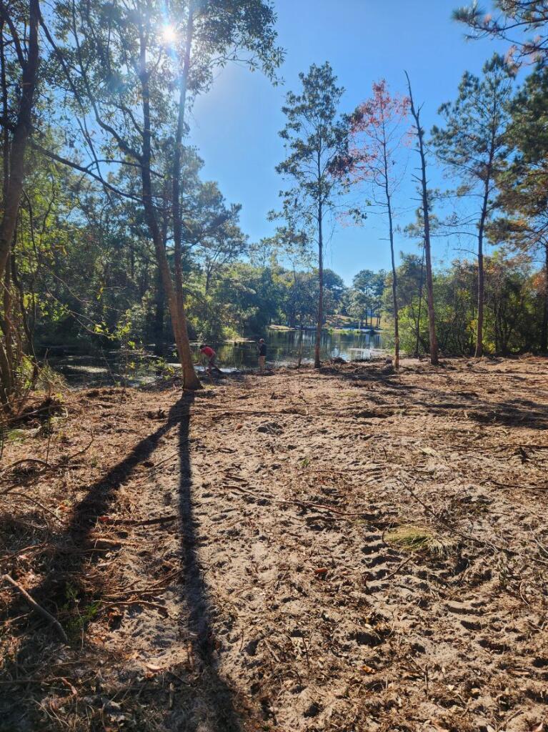 This 1.28 acre lot has a portion that is cleared and ready to build a house on with access to the lake! Utilitiy hook ups available water and electricity.
