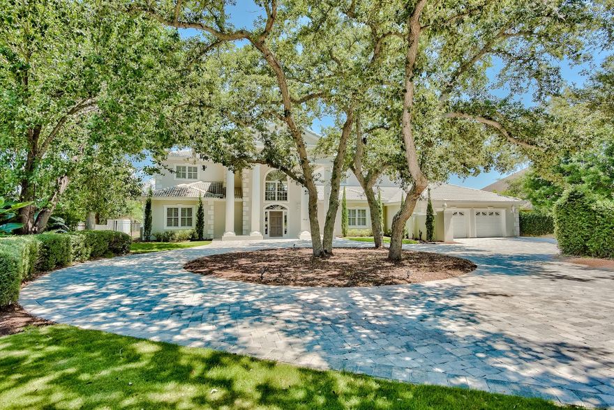 Majestic estate home on coveted Indian Bayou! This luxurious, custom-designed home with 140 feet on deep water Indian Bayou sits directly across from Choctawhatchee Bay. Spanning 4,624 SF, this magnificent waterfront residence is graced by soaring ceilings and wall-to-wall palladium windows creating a unique haven for gazing at the bayou and the bay. The grand entryway draws you into a stunning great room made for entertaining. The 2-story great room with French doors to the rear patio and pool is the dramatic focal point of the main level and features beautiful tile floors, columns, built-ins, fireplace and wet bar. The entertaining area continues onto a grand, covered and open patio in the back yard that leads out to the newly-built dock.