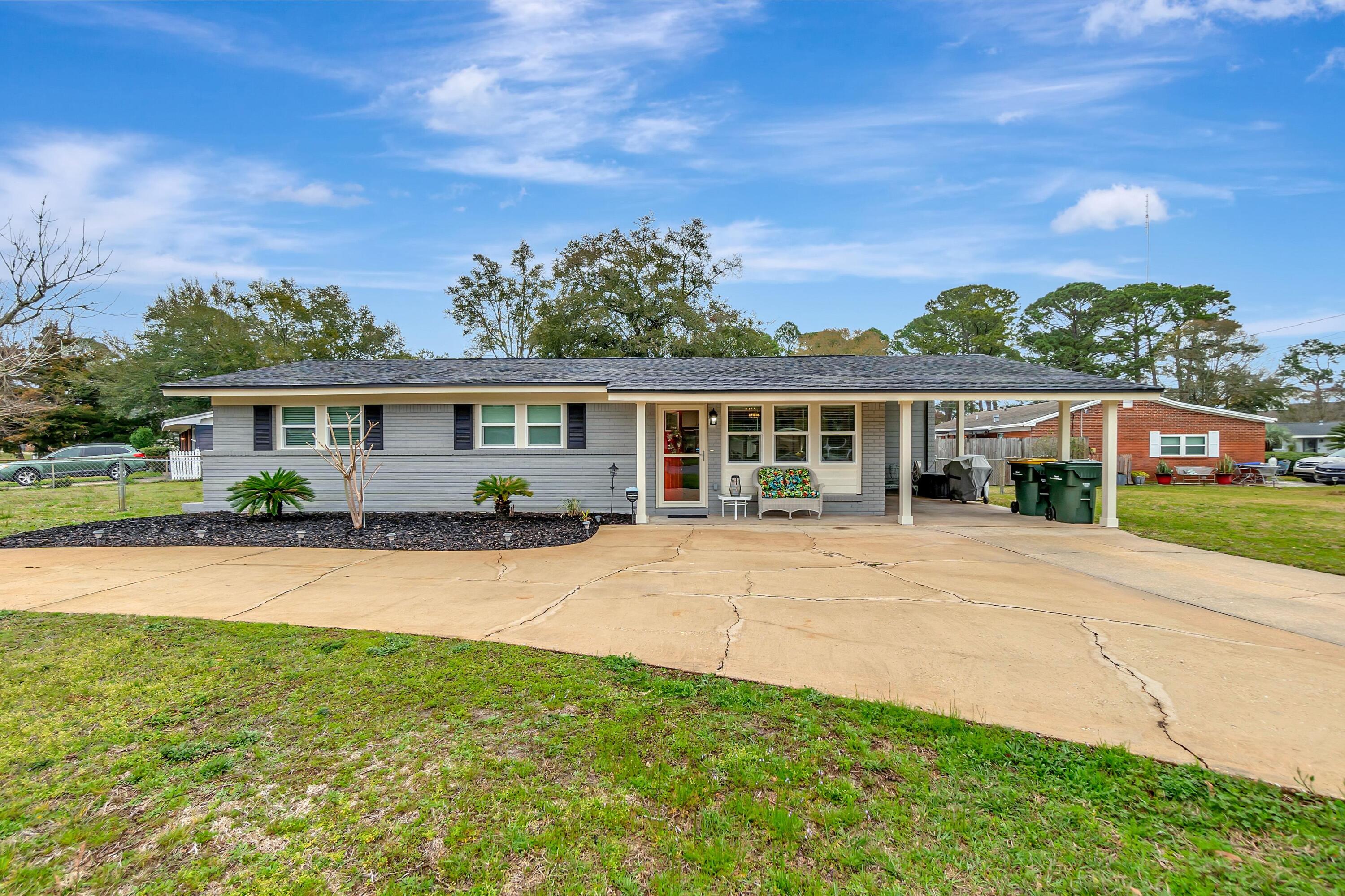 EXTREMELY MOTIVATED SELLER*** Situated in the heart of Fort Walton Beach, this charming, fully remodeled home occupies a generous corner lot, offering the unique advantage of being positioned right next to the delightful Cecelia Park and playground. The property has undergone a complete transformation in 2020, elevating it to a state of modern luxury while maintaining its inherent integrity.The home's classic brick exterior has been preserved, maintaining its original charm, while the interior has undergone a complete transformation. The custom kitchen is adorned with elegant granite countertops, and the flooring has been upgraded with sleek porcelain tile throughout the entire house.