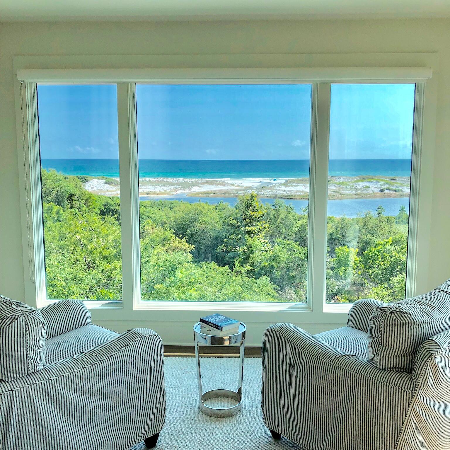 A MOST SPECTACULAR VIEW. This house sits on one of the highest points along Scenic Hwy 30A providing mesmerizing panoramic views over Topsail State Park, Lake Stallworth, and the Gulf of Mexico. A view so rare that it was granted a deeded view easement. No expense was spared on this 2017 total renovation. Brazilian hardwood decking with custom powder coated aluminum railing surround the upper level of the home. A coral paver lanai creates a magnificent setting for a heated salt water pool, hot tub, and grill area. The inside of the home boast a large open floor plan. The kitchen is well appointed with Thermador appliances and soapstone countertops. Bathrooms have Carrera marble floors and custom built floating vanities fitted with soapstone countertops and nickel plumbing fixtures.