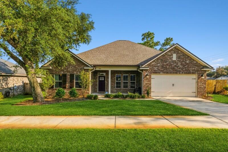 Welcome to this fabulous 4-bedroom, 2-bathroom home with a versatile flex space, designed for comfort and convenience. Located in a small private neighborhood, this property offers a prime location with easy access to various amenities.Step inside to discover an inviting open concept layout that seamlessly connects the living spaces. The stunning wood floors throughout the main living areas add a touch of elegance and warmth to the home's interior.The spacious living room is open to the well-appointed gourmet kitchen, complete with stainless steel appliances, granite countertops, a large center island, with ample storage.The flex space is a versatile bonus that can adapt to your lifestyle needs, use it as a home office, playroom, fitness area, or even convert it into an additional bedroom