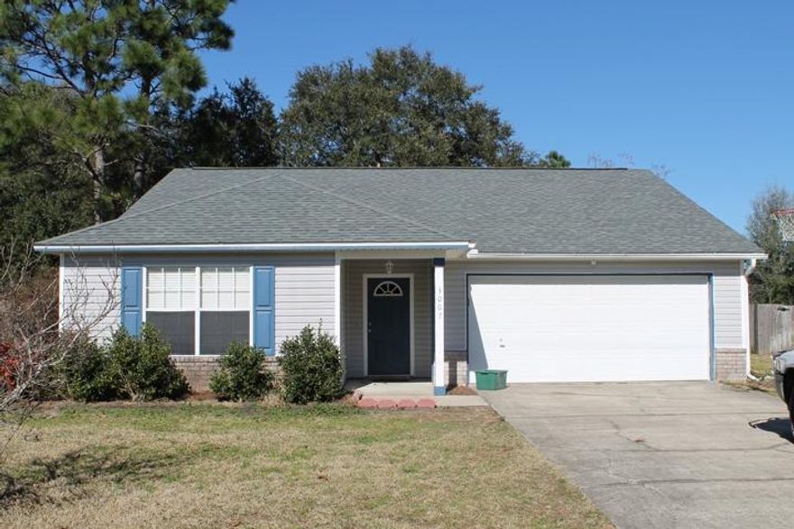 Must see this fabulous home. Great location south of I-10 for an easy commute to the base. Open concept family room with vaulted ceilings and tile floors. White kitchen with pantry and breakfast nook. Master bedroom is large; you'll find a double vanity, soaking tub and walk-in closet in the master bath. Inside laundry room and covered rear patio are welcomed amenities. This home was just freshly painted and has brand new carpet in the bedrooms. Treed back yard is partially fenced and has a sprinkler system with lawn pump. New roof in the last couple of years. Come see this great home today and make it yours!