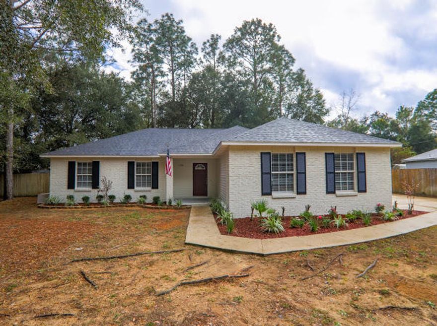 Completely remodeled 2003 3 Bedroom 2 bath 2 Car Garage on big lot,,,New Roof!! 11k... Huge roof.. Updated Kitchen with granite, glass back splash, stainless steel appliances, new fans and lights, new laminate flooring, carpets bedrooms, updated baths with granite etc etc...