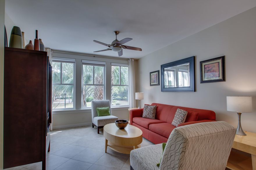 Enjoy the convenience this second floor, fully furnished Bahia condo has to offer. An open living space & large bedroom offer views of the Grand Lawn. Bahia has a prime location in the heart of the Grand Complex within The Village of Baytowne Wharf, a year-round pedestrian village with shops, dining, playground, live music and more. Owners have access to the private Solstice Club on the bay, an amenity for owners and their guests, featuring outdoor barbecue area, kitchen, screened porch with gas fireplace, indoor bar, flat screen TV, and comfortable seating inside and out. The Grand Sandestin community also offers a resort style pool, hot tub and fitness center. There is an interior owners closet inside the unit, garage level parking, and separate storage cage convey.