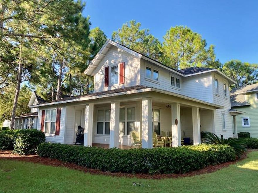 You must see this cottage nestled in a cul-de-sac on hole 3 of Raven Golf Course.  Welcoming wrap porch with course view.  Interior has soaring ceiling and open entertaining area. Natural light and updated interior. Whether a primary home or vacation-rental, this well-appointed property offers relaxing interior and exterior living space. Association takes care of all the landscaping! New air conditioner! Ask for rental projections and note that current rentals will  be honored by new owner. Furnished. Sandestin Owners Assoc: $383.93/ qtr. and Laurel Grove  $350/ mo. New buyer fee is 0.5%. Please confirm all measurements, fees, and other information. Neighborhood has a pool and exercise facility. Please confirm all measurements, fees, and other information.  Make this one yours!