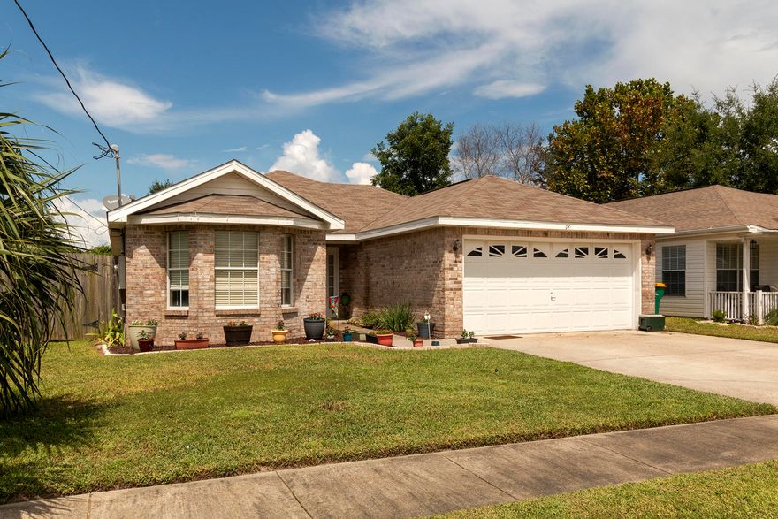 Amazing 3BR/2BA, 1,495SF Home with a large open deck overlooking the gorgeous backyard. Entering the home you a greeted with an open living area with wood burning fireplace and access to the large screen patio. The kitchen features custom tile countertops, beautifully painted cabinets, and black appliances. The master bedroom features access to the screened patio and a large master bath with built-in vanity. There are also two additional bedrooms, a hallway full bath, & a two car garage. The backyard is a work of art with large screened patio, unique garden planters, and a large deck overlooking the beautifully manicured yard. Don't miss this great opportunity to own an amazing home in the heart of Destin. Check out the virtual tour for a 3D virtual walkthrough of this home.