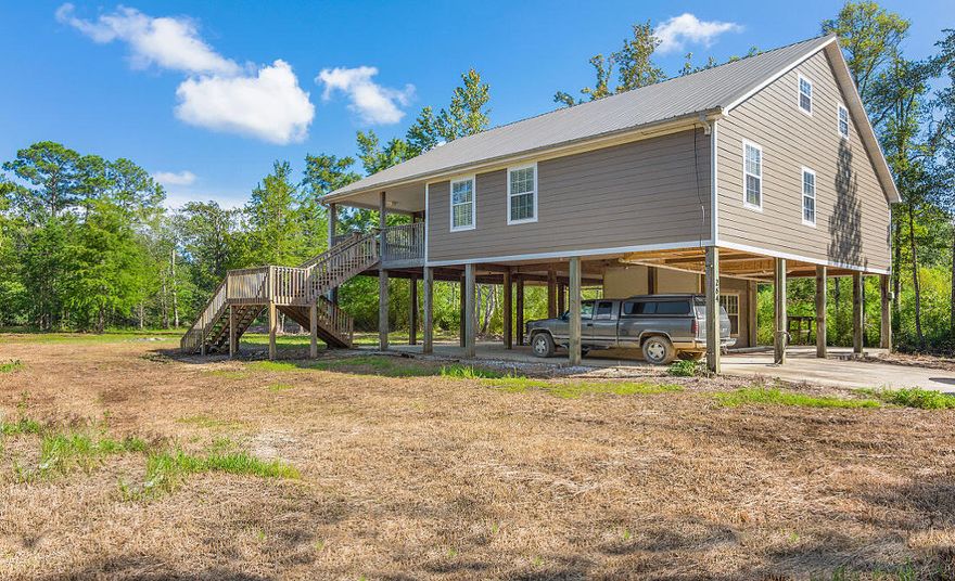 NEW PRICE ON ALAQUA CREEK PRIVATE RETREAT! Newly remodeled on 2 Lots with 120' on water and almost 3,000SF!! The Lawn is your blank canvas to landscape & design. Home has new Hardi-plank siding & metal roof. New HVAC & plumbing. Screen porch, too! Second level living area w/open Kitchen, Dining & Living Area. Kitchen has new cabinets, plenty of storage, coffee bar, unique Heartland range & DW, plus view of the Creek! Living Area has built-in FP, storage & barn-door. Spacious Master Suite has a Creekview, new carpet & new Bathroom. New carpet in all Bedrooms. Washer & Dryer in Laundry Rm conveys. Third Level is Huge w/new carpet & view of Creek! Endless possibilities as game/media rm, music rm, exercise rm, office, etc. Boat & Fish to the Bay! Must see this Home & Enjoy Nature !