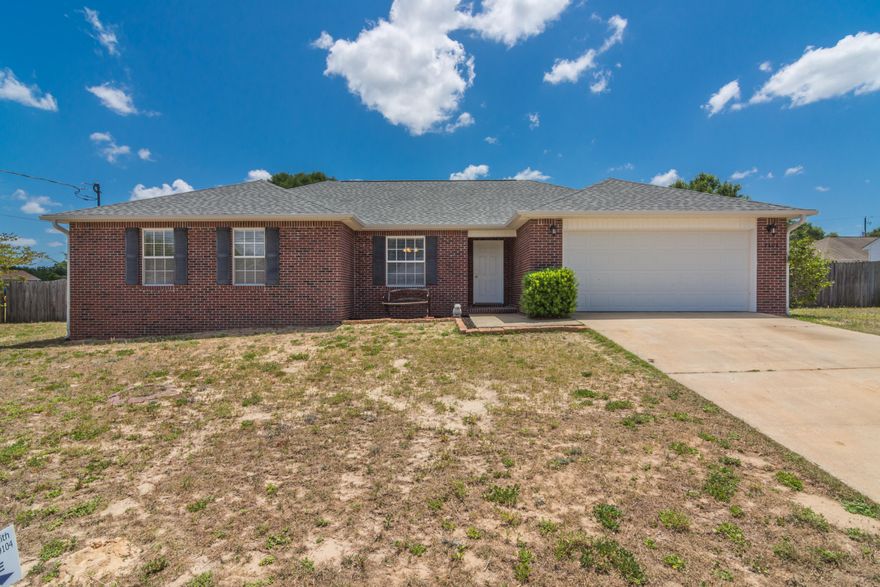 Turn key 4 bed, 2 bath home now available in central Crestview! Easy commute to town and local bases!This move-in ready home features an open concept living, kitchen, eat-in breakfast & formal dining set up. Split bedroom floor plan! Throughout the main living area, you will find updated wood look laminate flooring. Living room features vaulted ceilings.Kitchen features breakfast bar, great for entertaining! Above mount microwave recently installed.Master bedroom features a trey ceiling & large walk-in closet. Master bath has double sinks and garden tub/shower combo.3 additional bedrooms boast great natural light & ample bedroom space! Carpet in all bedrooms less than 1 year old! Home also features a Nest thermostat.Dimensional shingle roof installed in August 2019!(continued)