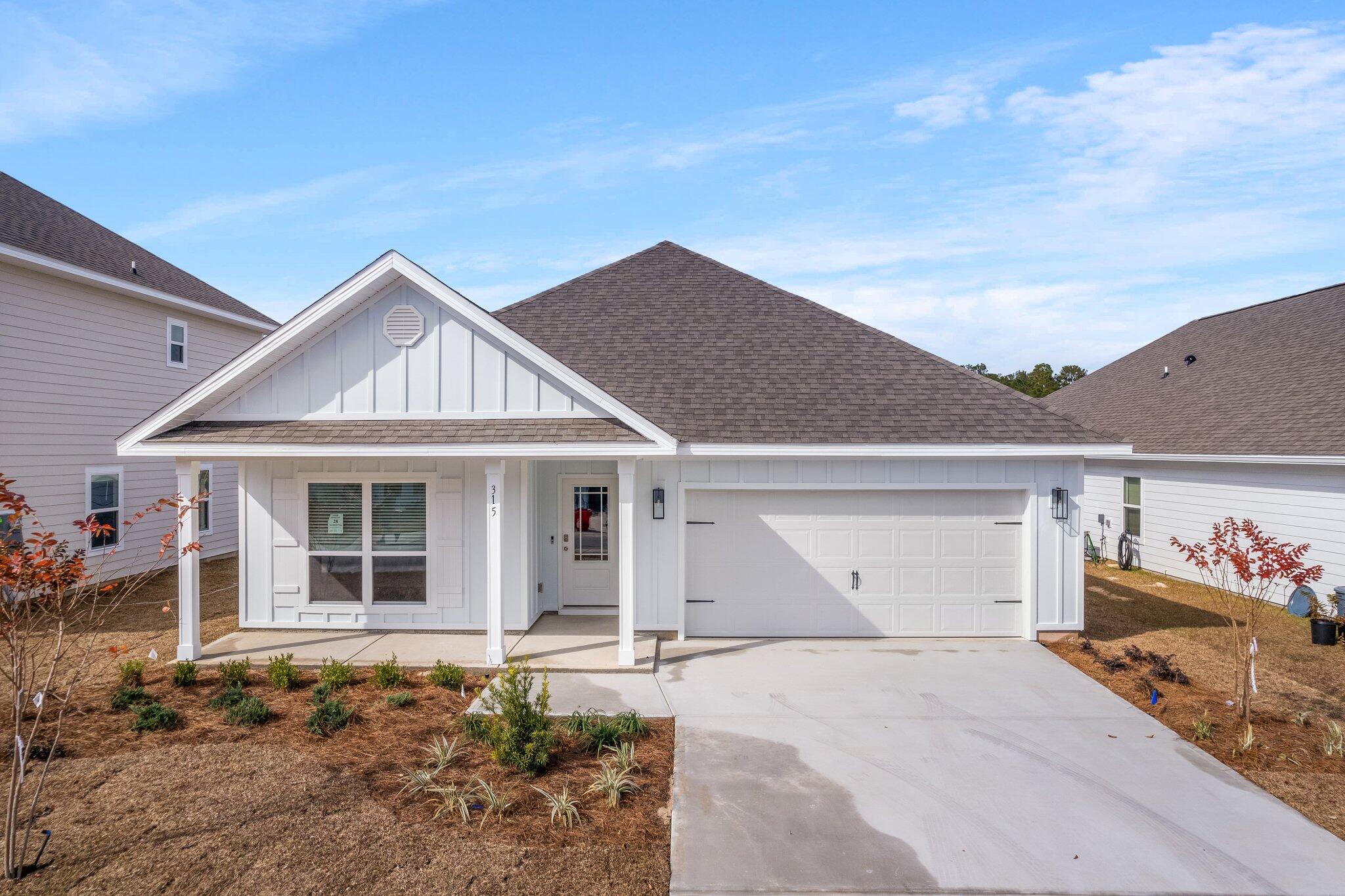 315 JR's Way is a 4 bed, 2 bath floor plan home located in The Preserve at Paradise Cove! Standard features of this home include elegant 9' ceilings, Light wood look EVP flooring throughout, Stainless steel appliances include a free-standing smooth top range, refrigerator, microwave/hood, and dishwasher. Beautiful painted shaker style cabinetry and granite countertops in the kitchen and bathrooms. Master suite has a spacious bathroom with double vanity, tiled shower with separate garden tub and large walk in closet. This home is located in the middle of all schools, restaurants, entertainment and 30A!