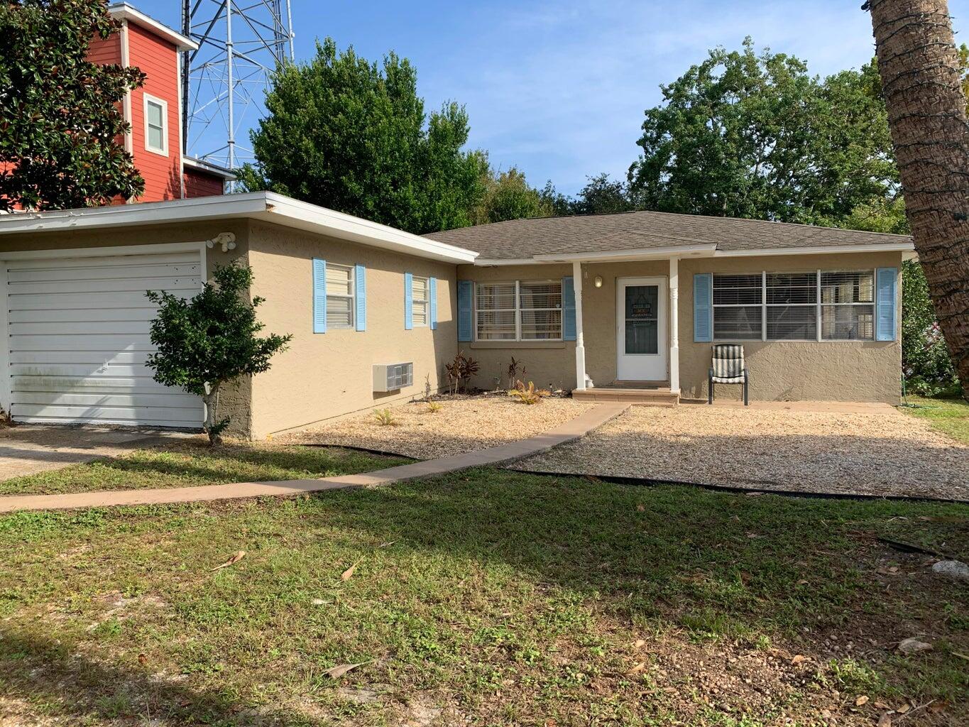 This wonderful ranch-style home is located 5 blocks from the Gulf of Mexico, allows short-term rentals, and positioned on a fully fenced 60' x 120' lot.  Step inside to find an over-sized living/dining combination, along with two full bedrooms and full bath on the hallway. The third bedroom is within the enclosed garage, which also has a full bath and has a separate entry way - perfect for a lockout unit or a home office.  The main living room includes a bonus room that can also double as your family room, game room or study. El Centro has no HOA fees an offers convenient access to Pier Park, shopping and restaurants, and a golf cart ride to the World's Most Beautiful Beaches.