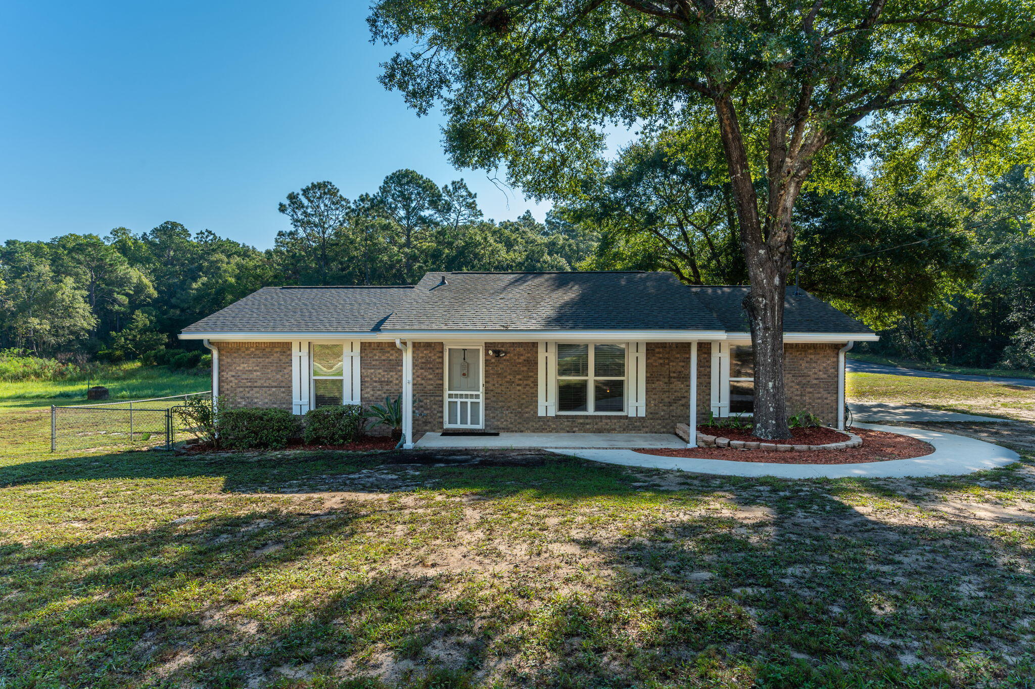 Move in ready 3 bedroom 2 bath home on a large half acre corner lot with brand new roof, gutters, interior and exterior paint. 2015 gas Water heater. Located in central Crestview providing easy commute to the local bases, beaches, and shopping centers. Split floor plan provides privacy for each room. Large living room great for entertaining family and friends during football and upcoming holiday season. Kitchen provides plenty of counter and cabinet space to meet all your cooking needs.  Windows have a lifetime warranty. Portion of the backyard is fenced in with chain link providing a safe place for the kids and family dog to run and play.