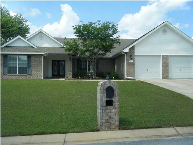 WOW!COMMUNITY SWIMMING POOL and tennis courts! Bonus Screened Florida Room!The EXTREMELY SPACIOUS split bedroom plan boasts OVERSIZED ROOMS. Owners have recently added a 16x16 screened in porch/Florida room! Double Leaded Glass Entry doors that open into foyer. The open floor plan features a large family room with gas fireplace and sliding glass door leading to the screened porch. Open formal dining room, HUGE kitchen with tons of storage and counter space ,built in desk, breakfast bar and an eat in breakfast room. One side of the home features 3 generous sized bedrooms and full bath, opposite side features a HUGE master suite with 2 walk in closets, large bathroom with garden tub, double vanity sinks, and separate shower. The Backyard is fully fenced,and the shed conveys!Close to schools