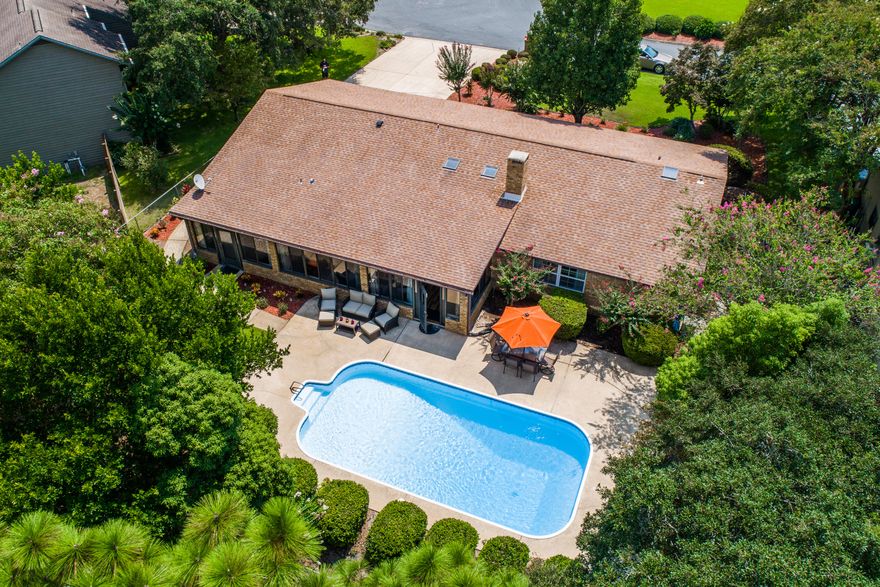 No private showings until after the open house on Saturday 8/22 1 -3. GREAT LAKE LORRAINE ESTATES LOCATION! The great community and breathtaking yard of this 4 bedroom, 2 bath, all brick home will immediately draw you in, wanting to see more. Enjoy your free time relaxing in the sparkling in-ground swimming pool and perfectly manicured backyard with views of the rolling hills of the Shalimar Pointe golf course. The views are breathtaking and combined with the spacious pool deck, make for the perfect place to entertain. The oversized driveway allows for additional parking and RV sewage access.