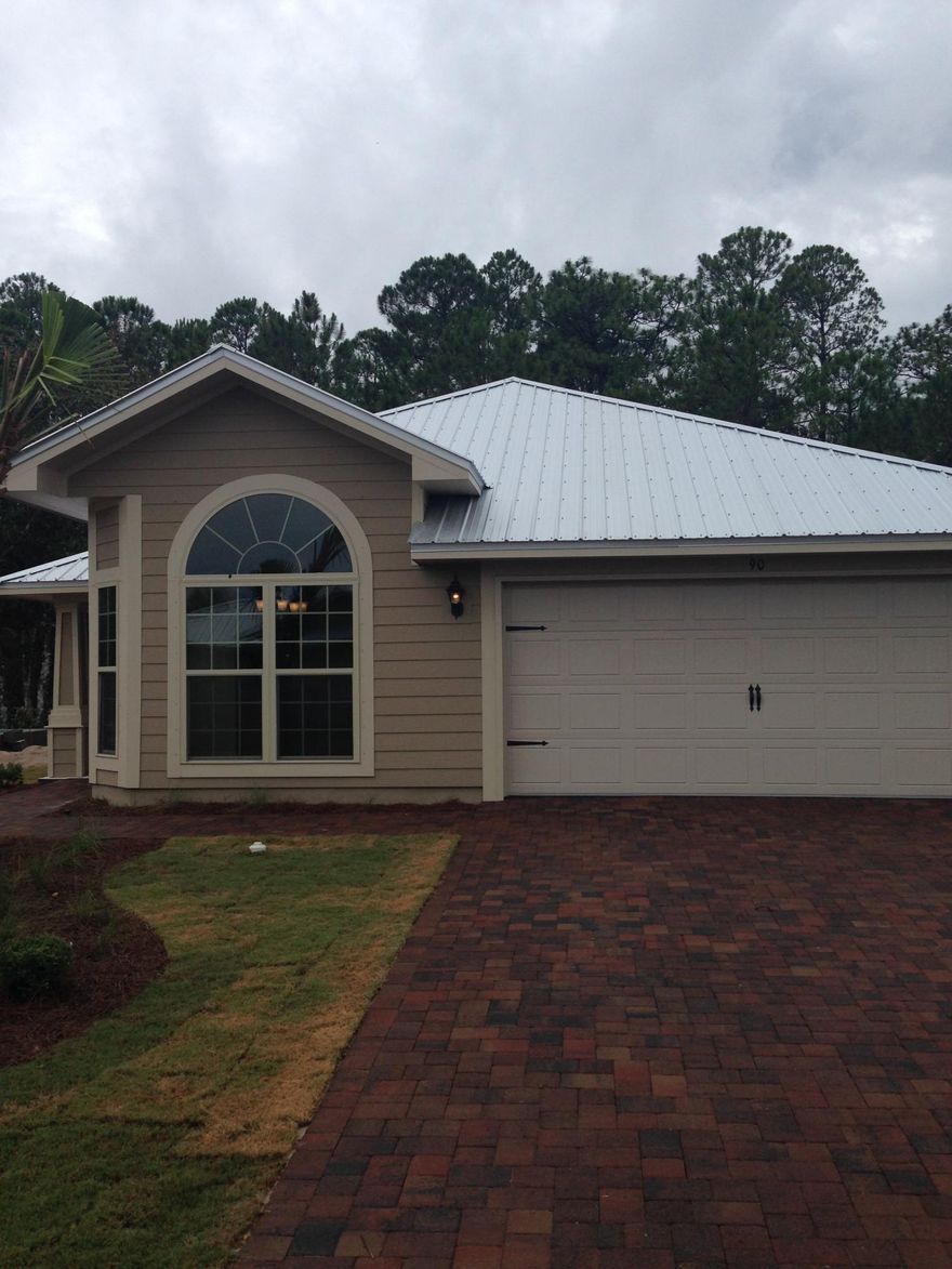 To be built - lovely Florida Cottage with 2 covered porches! 3/2 with 2 car garage, Hardie Board with Metal roof, lovely tropical landscaping including 5 palms, sprinker system with well. Interior features boast vaulted and tray ceilings, granite counters, bullnose corners, arches, Moen fixtures and more. Still time for buyer to choose color selections! Community pool available in neighborhood to join for $200/yr. Walk to Bay access and Marigny Restaurant! Builder warranties plus closing costs paid (except prepaids).