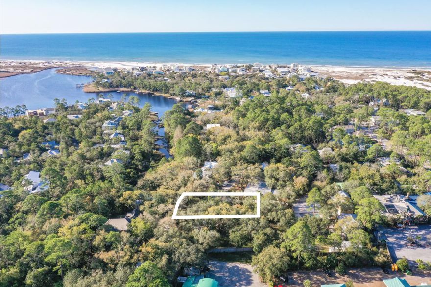 Nestled on ''the Trail'' in the historic and eclectic community of Grayton Beach, is this one-third acre homesite sitting across the road from Western Lake.  Grayton Trails Road is one of the most picturesque settings boasting overarching mature moss-draped oaks & magnolias just off the 30A bike path, and just a short walk down enchanting 'Grayton Trail' to award-winning Grayton Beach. No build out time and no HOA!  Few large lots remain on Grayton Beach's sought after 'Grayton Trail' site of grand century-old homes just steps to the beach. PLANS for guest house INCLUDED IN LOT PRICE!