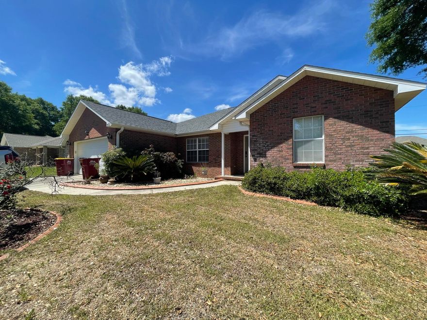 Centrally located 4br/2ba home located in Old Bethel Estates with easy commute to 7SFG and Eglin AFB. Open concept with large living room, vaulted ceilings and corner electric fireplace. Wood flooring found in living room/hallways, tile in kitchen/bathrooms, carpet in bedrooms. Kitchen with ample cabinetry, tons of counter space, stainless appliances and a pantry. Primary bedroom opens up to a nicely sized bathroom tile shower, updated vanity, and soaking tub. Three additional bedrooms and full bath finish off this spacious floor plan. 1/4 acre lot has a fully fenced flat backyard with firepit, paver patio, and storage shed.