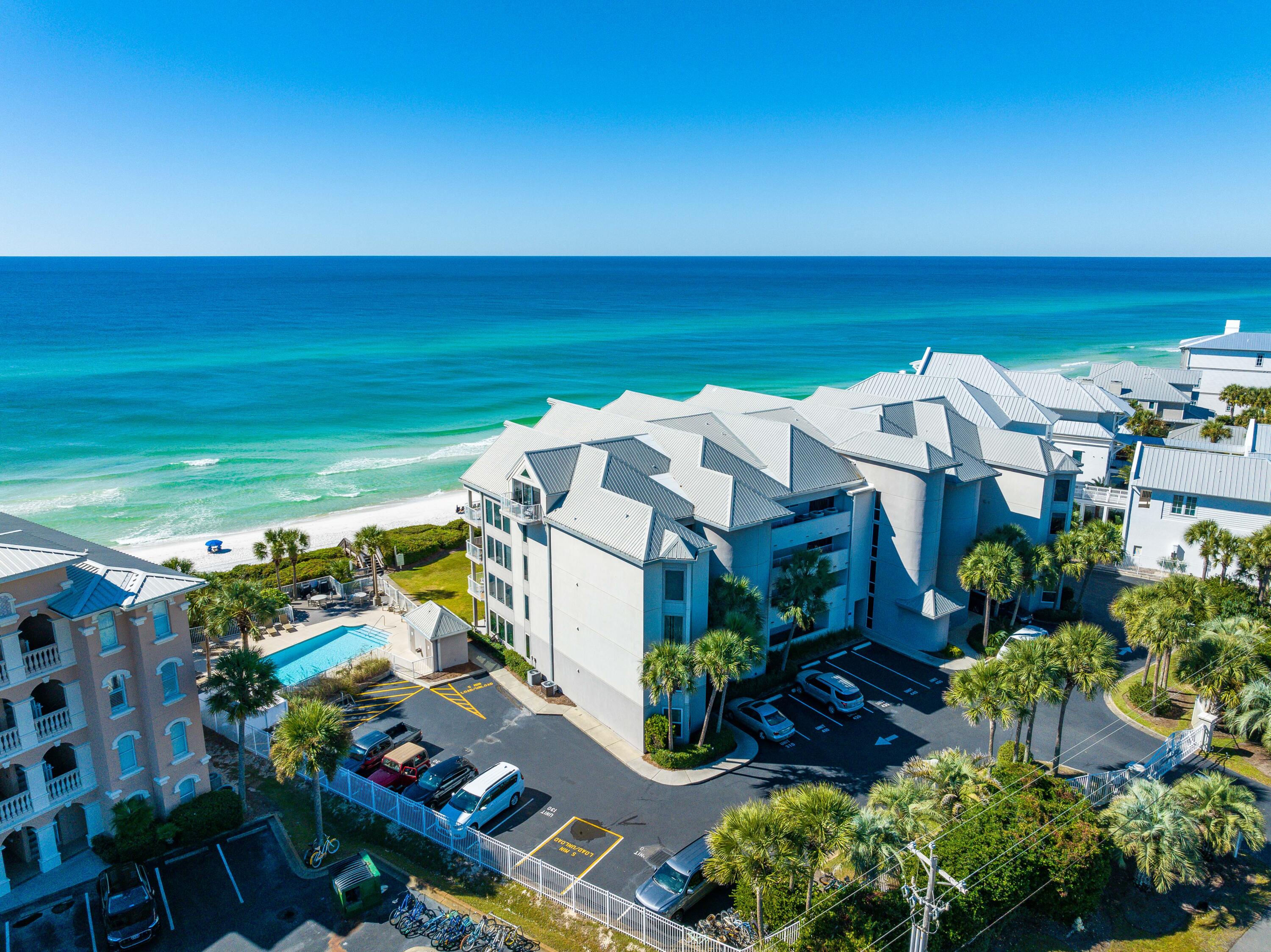 Price just reduced for quick sale! Come and see this spectacular unit that boasts rental projections of over $120k. Whether for personal use or rental purposes, Tranquility on the Beach, Unit 230 is the perfect place to call your own on 30A. Situated right on the beach, this unit offers breathtaking views of the emerald waters and white sandy beaches from the master bedroom, kitchen, and living room. With three bedrooms and three bathrooms, it is an ideal primary, second, or investment home. The kitchen is spacious and well-equipped with stainless steel appliances, ample storage, and white countertops. The dining and living areas are open-plan, perfect for entertaining. Enjoy the outdoors with a large patio overlooking the Gulf. This luxury gated condominium complex boasts only 20