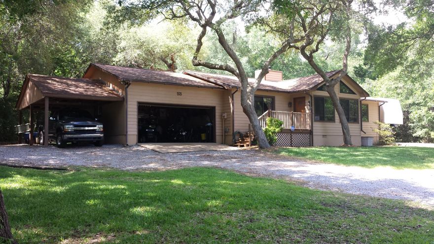 Welcome home ....This unique well maintained 1658 sq ft 3 bedroom/2 bath split floor plan home is located in Lake Sharon Estates. What a beautiful neighborhood surrounded by beautiful trees sitting on a .44 acre lot here is where you find peace and tranquility. Loaded with custom features and a whole lot of character, vaulted pine ceilings, a wood burning stand alone fireplace with hand laid stones( for those cold winter nights). Custom built cabinets, lots of counter space and textured ceramic tile make this kitchen a chefs delight. Large windows to enjoy the front yard view and a large deck in the back with a Sun setter retractable awning to enjoy those summer BBQ's with friends and family. Plenty of room for all your outside toys, 2 car garage with storage room and overhead shelves.