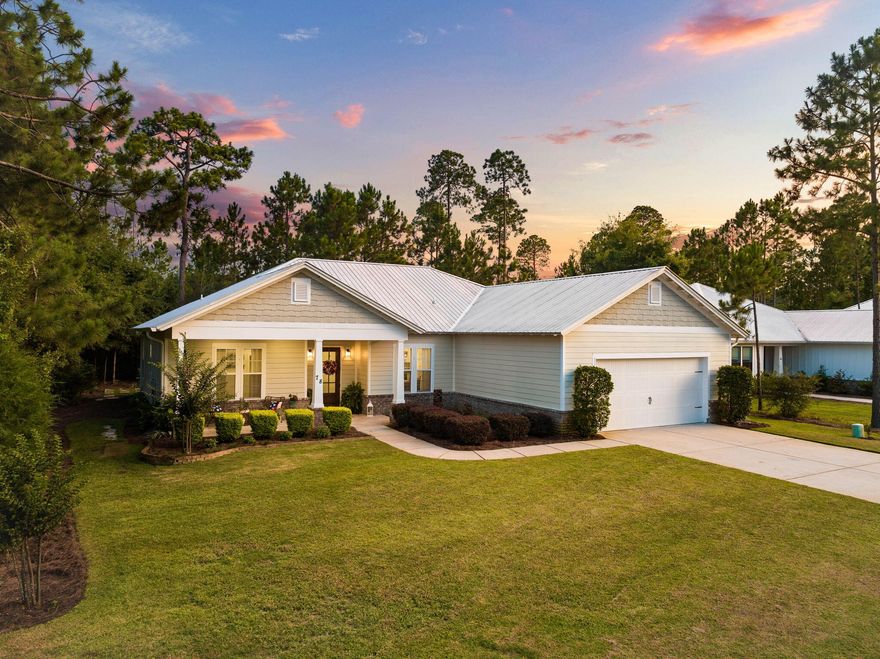 Welcome to your coastal oasis at 78 Grizzly Street in Freeport, FL--a truly one-of-a-kind coastal-craftsman residence that seamlessly blends modern sophistication with timeless charm. Constructed with Hardiplank siding and topped with a durable metal roof, this home is built to stand the test of time while capturing an inviting, stylish curb appeal. An innovative irrigation system featuring its own well ensures your landscaping remains lush and vibrant throughout the year.Step inside to discover an expansive open floor plan designed for modern living. Upgraded lighting fixtures create a warm, ambient glow throughout the space, while gourmet granite countertops in the kitchen add a touch of luxury. Every detail has been thoughtfully curated to enhance both style and functionality, providing a comfortable setting for your daily activities.

Outside, enjoy over 490 square feet of covered porchesperfect for alfresco dining, relaxing with a book, or entertaining guests in the Florida sunshine. The home's design effortlessly connects indoor and outdoor living, creating an ideal environment for both quiet moments and lively gatherings.

Residents also benefit from a vibrant community lifestyle with resort-style amenities. Enjoy tennis, pickleball, and basketball courts right at your doorstep, with a playground and pavilion in developmentideal for families and those with an active lifestyle. Located just minutes from the pristine South Walton Beaches, Scenic Highway 30A, and the tranquil Choctawhatchee Bay, this exceptional property offers unparalleled access to some of Florida's most sought-after coastal experiences. Schedule your private tour today and experience the perfect blend of luxury, convenience, and coastal charm.