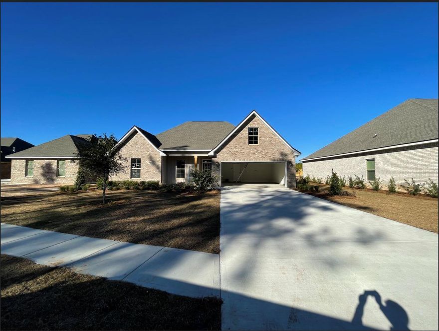 The CAMELLIA IV H in The Trails at Hammock Bay community offers a 4 bedroom, 2 full bathroom, with an open design. Upgrades include luxury wood look tile flooring, quartz counters, upgraded cabinets and more! Special Features: Private water closet, double vanity, soaking tub, separate shower, walk-in closet in the master suite, covered rear patio, recessed can lighting, ceiling fans in living area and all bedrooms, framed mirrors for all bathrooms, undermount sinks, bronze plumbing fixtures, smoke and carbon monoxide detectors, garage door with hardware and two remotes, seasonal landscaping package, architectural landscaping package, 30 year shingles and more! Energy Efficient Features: Gas appliance package, Vinyl Low E MI windows and more!