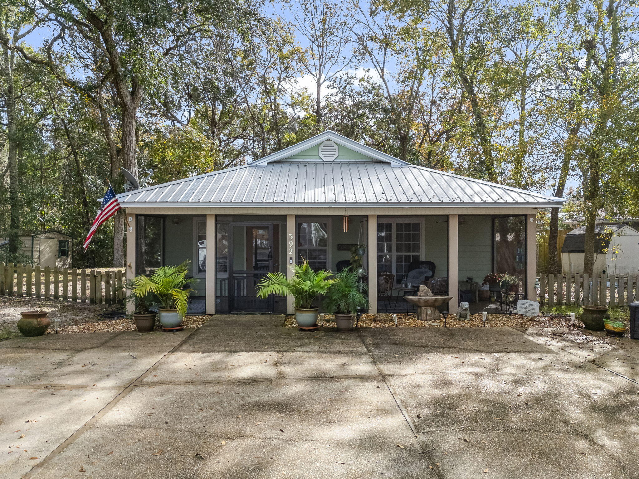 Seller offering up to $5,000 credit toward closing costs! No HOA and low Walton County taxes in a prime location! Just minutes away from the 331 Bridge and the pristine beaches of 30A, this beautifully updated 3 bedroom, 2 bathroom home offers the ideal blend of convenience and tranquility.Move-In Ready! This charming Florida cottage features a desirable split bedroom floor plan, enhancing privacy and comfort. The open-concept living area boasts LVP and tile flooring throughout, ensuring durability and ease of maintenance.Indoor-Outdoor Living at Its Finest! Relax and entertain with ease, thanks to not one, but TWO screened-in patios, and a large, fully-fenced yard.Enjoy peace of mind with a new metal roof (2022), newer HVAC and hot water heater.Your peaceful retreat awaits!