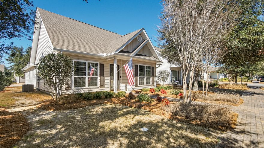 When location is everything! This 3-bed, 2-bath cottage nestled in the heart of Hammock Bay is thoughtfully upgraded. Home offers modern living without sacrificing charm. Kitchen serves as heart of home, featuring granite countertops, pendant lighting, custom 42-inch cabinetry, and striking stone tile backsplash. Stainless steel farmhouse sink on large island creates ideal space for meal prep and gatherings. Primary bathroom showcases cultured marble vanity and a trendy barn door that adds distinctive character. Peace of mind comes standard with hurricane wind screens, whole-house surge protector, and heavy-duty security storm door. AC capacitor replaced in 2022 and garage offers built-in workbench. Within walking distance of pool, fitness center, athletic courts and restaurants.