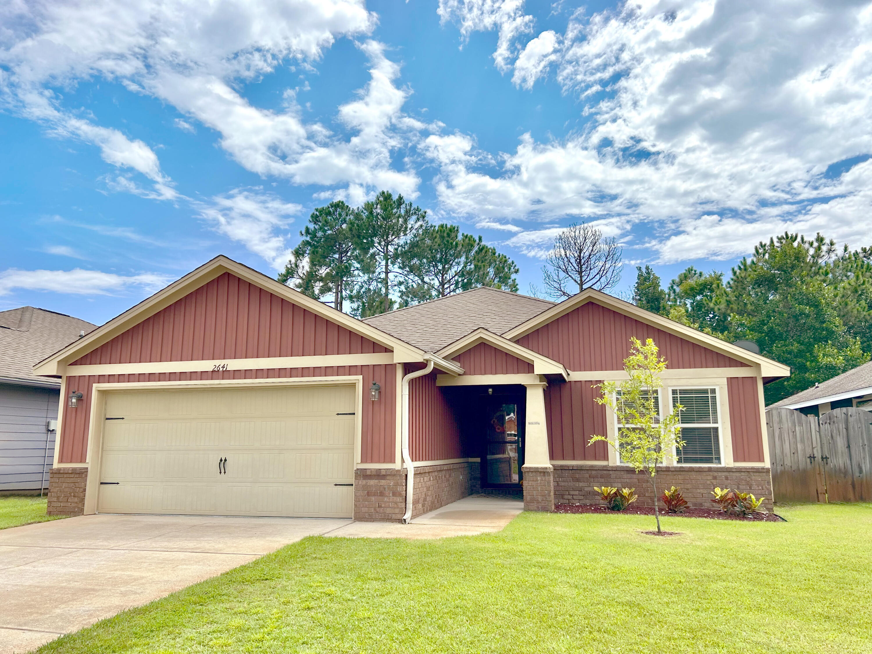 This beautiful 4-bedroom, single-story home boasts over 1700 square feet. It includes a private fully fenced back yard, spacious covered patio, 2-car garage and NO HOA! You'll be close to the YMCA, soccer fields, youth sports, high school, and more. Area bases include Hurlburt Field and Eglin AFB. Enjoy the savings of a minimal electric bill complements of Solar Panel energy - which convey completely paid for with an accepted offer. As you enter the home you'll be drawn to the large open living room with an abundance of natural light, hard wood floors, and cathedral ceiling. The freshly painted walls provide a bright and modern feel. The well-appointed kitchen is complete with granite countertops, ample cabinet space, pantry, and stainless-steel appliances.