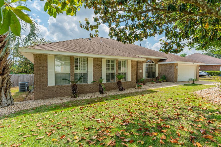 This stunning 4/3 POOL HOME is a true oasis-offering both a gunite pool and screened in back porch in the fenced in backyard. Head into the home and prepare to be impressed by the spacious livingroom with a wood burning fireplace as a focal point.  The expansive kitchen is a chef's delight featuring ample counter space, abundant cabinet storage, and the perfect layout for entertaining guests. The large primary suite offers a stand-up shower, soaker tub, and double vanity. Each bedroom is generously sized. Schedule your showing today!
