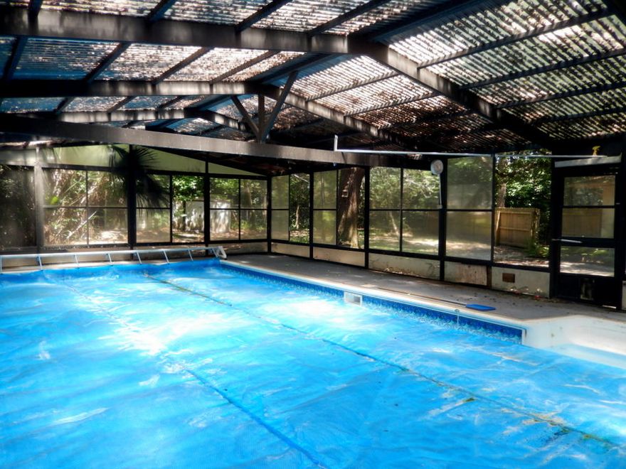 Grab this opportunity to own one of the lowest priced homes in Poquito Bayou! Although this home needs a lot of work,the floor plan provides 3 large living areas and 2 dining areas which provide plenty of space to work with. NOW is your chance to redesign and renovate a home exactly to YOUR taste! Adjoining a spacious glassed in Florida room, the master bedroom provides lots of living space. The giant detached in ground pool & screen enclosure allows you to enjoy the Florida lifestyle and the large backyard with two yard buildings provides privacy. Located in the heart of Shalimar, this home is close to the neighborhood boat launch & park,schools,restaurants and shopping. Take advantage of this opportunity today.