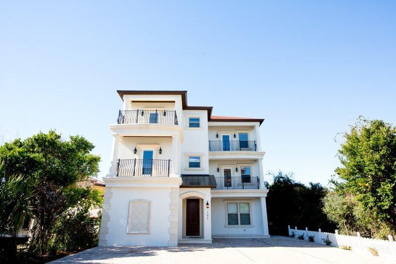 GORGEOUS, VENETIAN PALACE...OVER $250,000+ GROSS RENTAL INCOME ON THE BOOKS FOR 2014! This incredible rental machine is located in the prestigious community of Frangista Beach. This home grossed over $185,000 in 2013 with a partial rental season. Featuring 9 bedrooms and 9.5 baths, over 5,300 sqft heated and cooled and 6,400 total sqft, his home has it all, with incredible private amenities including a large theatre room, stunning watermark pool with private tanning deck and spa like design as well as a luxurious outdoor kitchen area with stainless steel appliances, and grilling area/bar, perfect for entertaining.