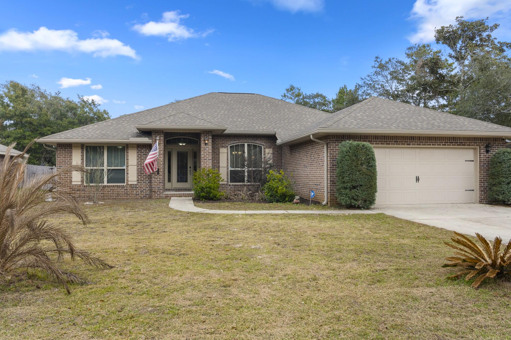 This spacious abode includes 4 bedrooms, 3 full bathrooms with quartz countertops, and a beautifully updated kitchen, also with quartz countertops. The primary bedroom has 2 separate walk-in closets, dual vanity, and a gorgeous new shower. This room also has access to the enclosed back patio. There is a separate office located away from the bedrooms - a huge bonus in this split floor plan! This home has an expanded driveway for extra parking and a 25ft boat house (the boat launch is just around the corner!) Home is in Flood Zone X - so less worries there! The solar panels are paid off and ready for you to enjoy low electricity bills! Storm shutters are also included with the home. Sellers are Motivated, so schedule a showing now to confirm that this home is perfect for you!