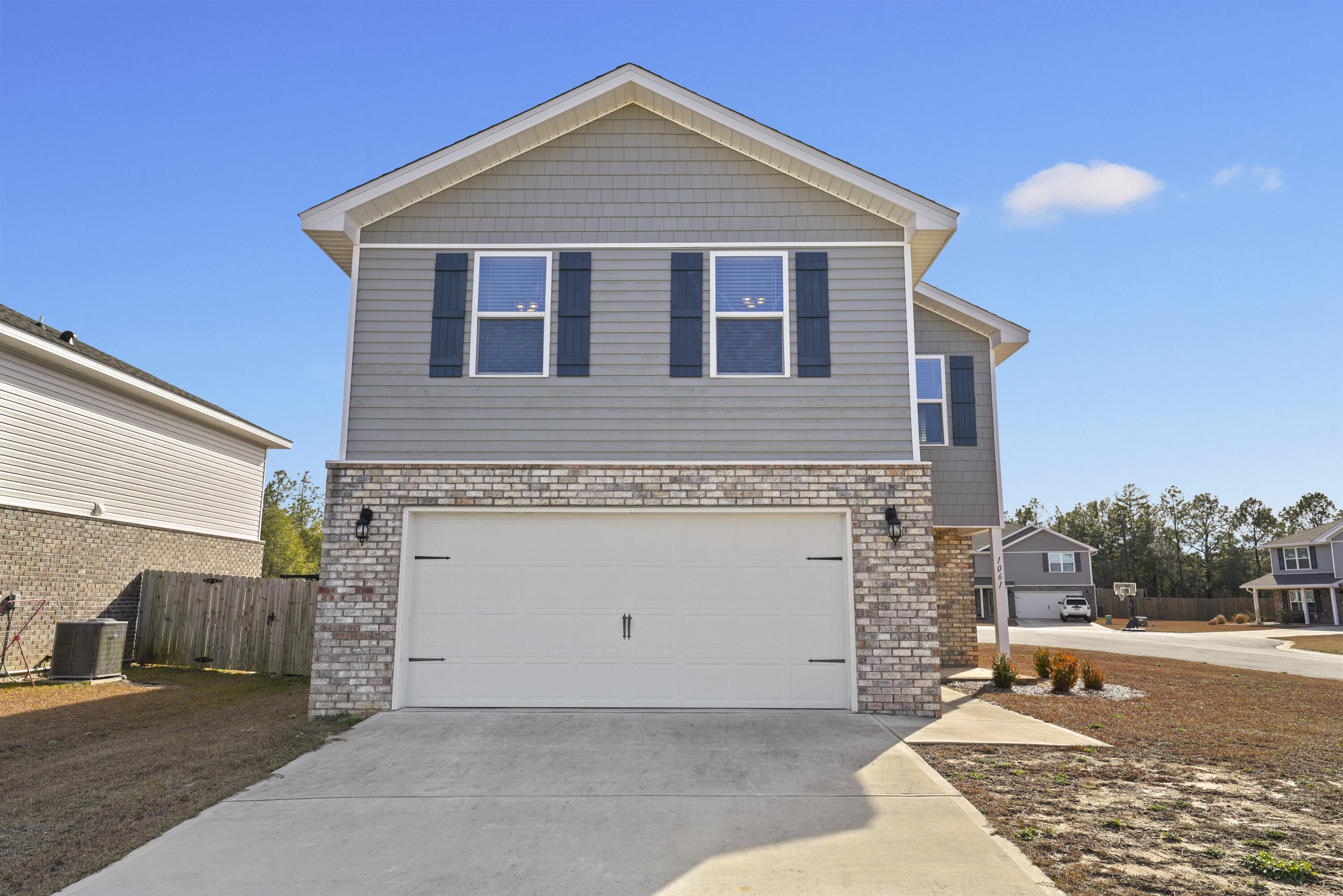 Welcome to 1061 Limpkin, a like-new 2020 DR Horton build situated on a large, fenced corner lot at Redstone Commons. Only one family has occupied the home since it was built. The Aisle floor plan is 4 bedrooms and 2.5 baths. On the first floor, you'll find an inviting open living room and kitchen design, perfect for families or entertaining guests. The kitchen is equipped with granite countertops,  a sizable island, and stainless steel appliances.The first floor includes wall to wall LVP flooring. All four bedrooms are located on the second floor. The primary bedroom offers ample space and a lovely adjoining bathroom with a double sink vanity and a spacious shower area. .