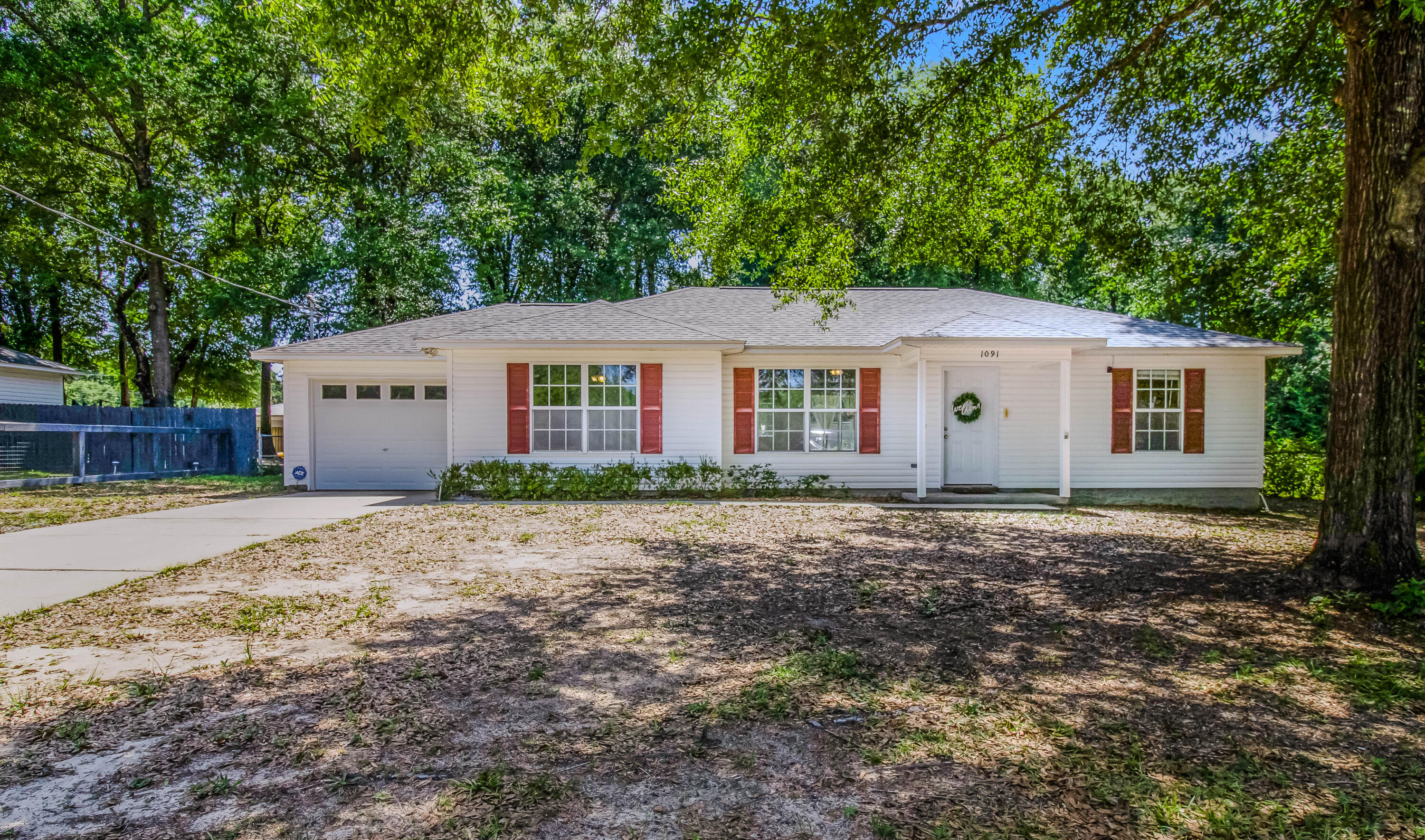 Welcome Home! Peace of mind in a peaceful setting. Updates include: Brand new 2025 roof, HVAC 2015, Water Heater 2020. Updated fridge and Bosch dishwasher. Freshly painted throughout, NO carpet! New LVP flooring. Open split bedroom floorplan flooded with natural light. This home sits on a nice sized level lot with mature trees. Hardwired ADT security system installed.