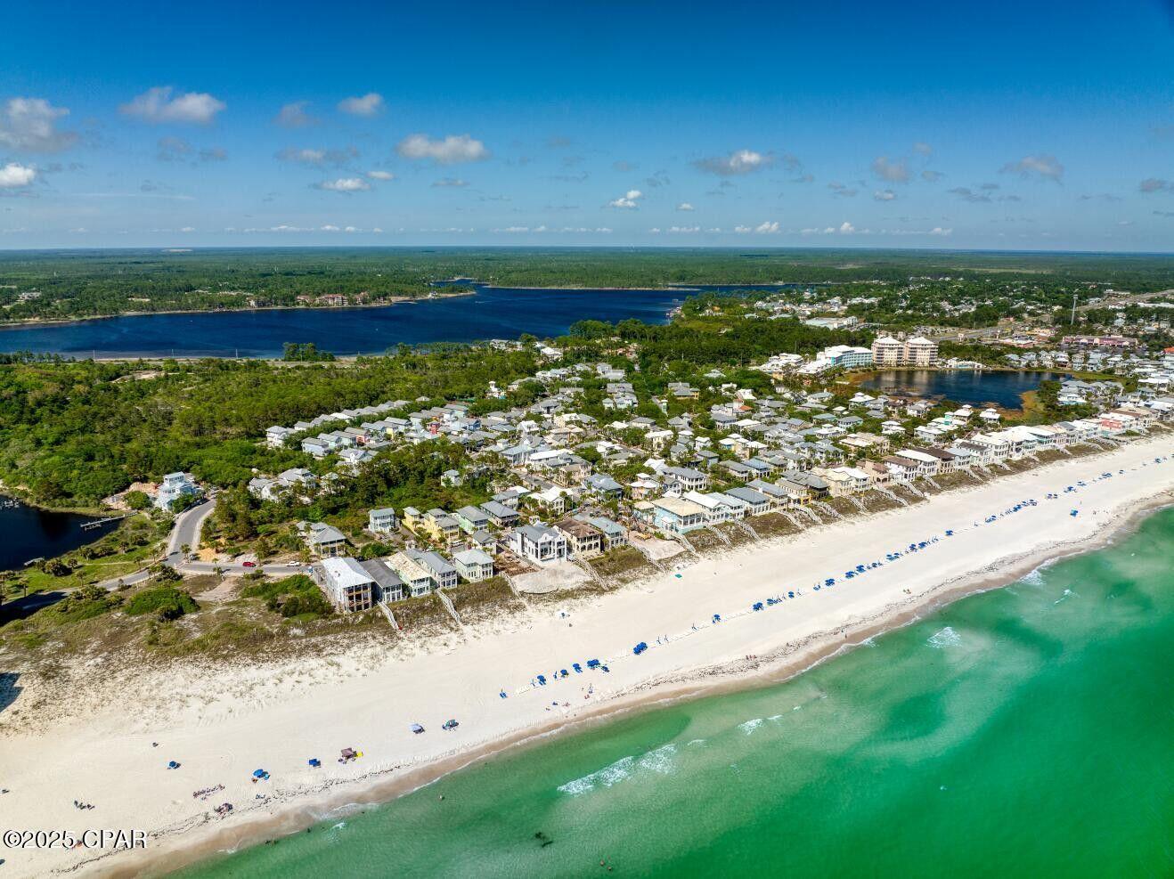 Welcome to 115 Cottage Court, YOUR COASTAL DREEAM HOME WITH GUARENTEED INCOME! Are you looking for a beach escape that works for you, even when you're not there? Look no further than this beautifully designed three-story coastal gem that's as charming as it is functional. Situated in a sought-after beachfront community, this property isn't just a home; it's an investment opportunity with an established income stream. Captivating Design and Features- This home boasts a stunning muted green facade, complemented by crisp white trim that surrounds its many windows and doors. The modern metal roof and vertical siding add a contemporary touch, while the inviting balconies on the second and third floors, complete with decorative brackets, offer a warm and welcoming outdoor space perfect for enjoying the coastal breeze. Inside, you'll find four spacious bedrooms and four bathrooms, each crafted with attention to detail and professionally decorated. Each room is designed to include ample light and space, making it the perfect retreat after a day at the beach or exploring the area. A Community Packed with Amenities - Living in this community means more than just enjoying a beautiful home. The neighborhood offers private beach access for those sunrise walks and sunset picnics. Community swimming pools, tennis courts, and a fully-equipped gym ensure you have plenty to do, while the on-site restaurants mean you don't have to travel far for a great meal. Investment Opportunity - One of the key selling points of this property is the guaranteed income. With a lease agreement already in place under a reputable property management company, you can expect a steady net income of $6,800 per month. This makes the home an ideal choice for those looking for a vacation rental investment with immediate returns, a second home, or even a retirement spot that pays off years down the line. The Perfect Fit - Whether you're an investor searching for a property that promises consistent returns, someone looking for a second home to make unforgettable memories, or planning for the perfect place to spend your retirement, this home meets all those needs. The professionally designed interiors and well-maintained exteriors ensure it stands out in a vibrant neighborhood. With so much to offer, it's no wonder this property is not just a place to live but a destination to experience life at its fullest. Reach out today to explore this exciting opportunity and make it yours.