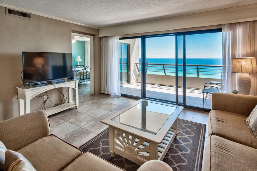 Welcome to you slice of the Emerald Coast! GULF FRONT 2 bedroom, 2 bath Destin condo for $420k. Nicely furnished, kitchen with granite, stainless appliances and light cabinets and tile throughout the entire condo! The private balcony brings in the light and is accessible from both the living area and the gulf front master bedroom, a stackable washer and dryer is also in the condo. Sleeping space for 6 with the guest bedroom and the sleeper queen sofa. STRONG rental income 2016 $48k and 2017 YTD is $43k. Amenities at Emerald Towers include a gulf front heated pool, tennis courts, gated entrance, fitness room with sauna, a community room, grilling area and on-site management. Located in the heart of Destin and close to dining, shopping and everything else that makes a vacation FUN.