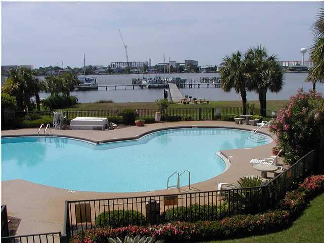 SPECIAL-BUY TWO UNITS #A412 & #A414 w/ONE 44ft BOAT SLIP DISCOUNTED: CALL FOR DETAILSOR BUY THIS UNIT ONLY, w/44ft BOAT SLIP...A Beautifully Updated, and Very Nicely, Fully Furnished Waterfront Studio Condo. Turn Key with everything needed to continue as a Vacation Rental, or Use as a Family Get-a-Way.. OR BOTH.. Or even a Long Term Rental. This Unit comes with your very own Assigned 44ft BOAT SLIP, #B13, which has Shore Electric and Water access at the Slip as well. Pirates Bay welcomes Owners and Guest to the facilities that includes two of the largest and most beautiful Pools in the local or surrounding areas, located right on the InterCoastal Waterway. Also a BBQ area with Picnic Table.. Feel free to walk the 121 Boat Slip Marina area, getting some excercise in, while enjoying the