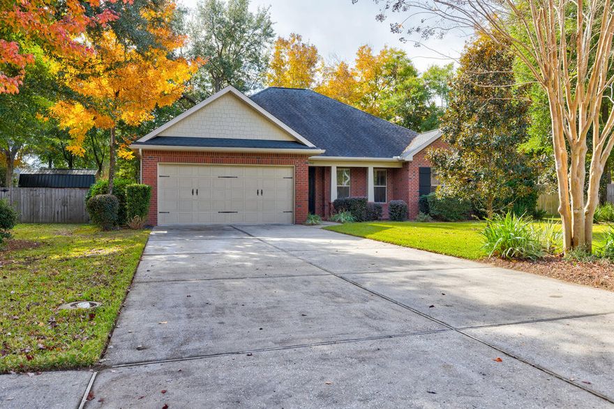 Welcome to the coveted community of Magnolia Woods in Niceville. This contemporary all brick residence built by premier builder Huff Homes offers over 2,100 sq.ft. of open concept living space featuring 3 bedrooms, 2 bathrooms, a bonus room while all being situated on almost a half acre. This private fenced-in backyard with a serene Koi pond allows for one's imagination to run wild as it is the only residence in the entire community to include a whole additional lot. Notable features/updates include eight-foot doorways, raised ceilings, crown molding, lots of natural light and wood flooring throughout the main living areas including the primary bedroom. The current owners converted the back porch to another living space/bonus room that's heated and cooled. Centrally located in the residence is the living room that's perfect for everyday living and entertaining while being the core of the home. The kitchen consists of granite countertops, stainless steel appliances, including a gas range, glass tile backsplash, breakfast bar, a pantry and flows nicely into your dining and living spaces. The primary suite is spacious with the primary bathroom including dual vanities, granite countertops, a spectacular tile walk-in shower, a water closet and a large walk-in closet. There are two additional bedrooms that have plenty of room and closet space that share a bathroom that includes double vanities, granite countertops and a tub/shower combo. As an added perk, there is a grand hallway closet for additional storage. This residence is perfectly located in a A+ rated school district, close to multiple military bases, local shopping and surrounding areas. As an added bonus, the Seller is offering up to $10,000 for Buyers to use towards closing costs with an acceptable offer. Come live your paradise in Magnolia Woods today! 