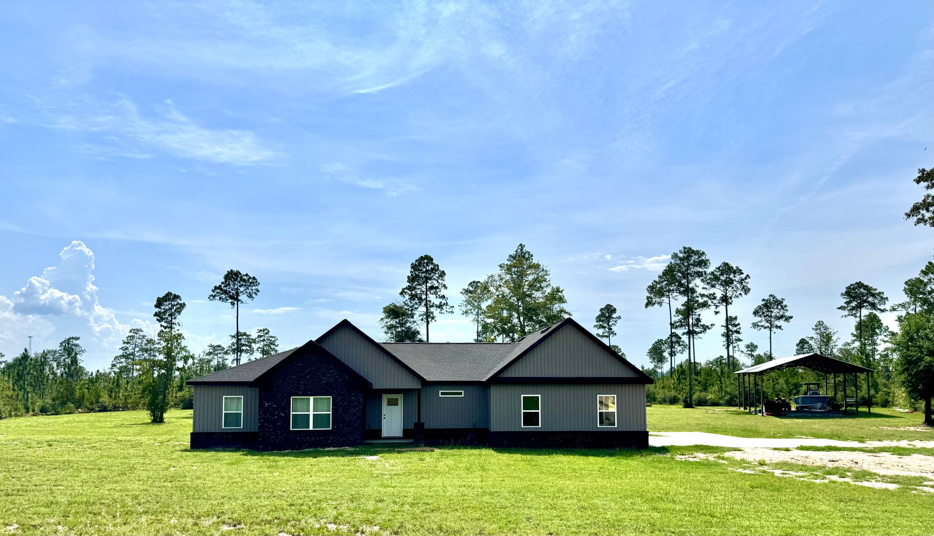 Welcome to your dream oasis! This custom built 2024 4 bedroom, 2 bath home nestled back on 40 pristine acres, offers the utmost privacy for peaceful living, recreation and homesteading. When the weather is cold or you are looking for ambience, inside you can cozy up infront of the electric fireplace or sit outside by the fire pit. This open floor plan provides space and luxury. This home is filled with country charm from the flooring, tile and lighting choices. The position of this home offers natural light that fills the home inside. Outside enjoy the stunning west facing sunset or one of the two established food plots. There are lots of deer and dove that visit this property daily. This is a rare find so don't miss your opportunity as properties like this are not available often.