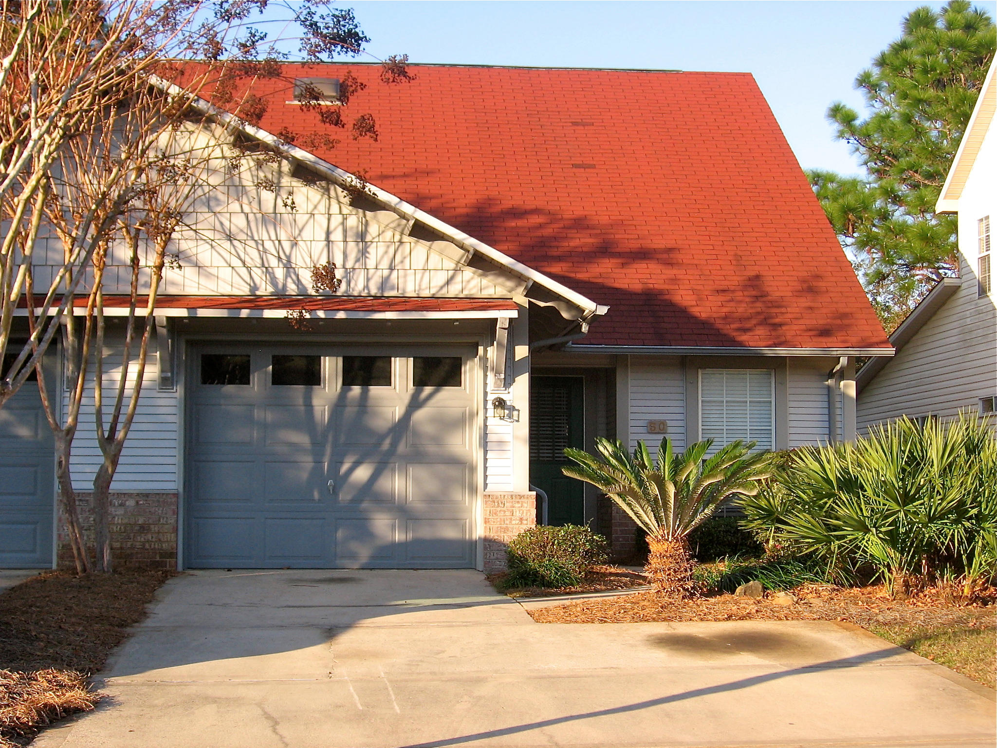 This is the lowest priced 3 bedroom home or townhome south of 98 in SRB! This 3/2 with a loft townhome not only has a garage and a screened porch, but also a fenced back yard and there's additional property beyond the current fence that just about doubles the size of the yard! The galley kitchen has loads of natural light. The dining area and living area are open for easy entertaining. A screened porch extends the living area! The master bedroom suite is downstairs and overlooks the private backyard. Upstairs you'll find two bedrooms, a loft and a full bath. Escada has a community pool and a walking path to Butler Elementary and the 30A bike path. This home would make a great primary residence, second home or long term rental property. Your dues cover mowing, even in your backyard!