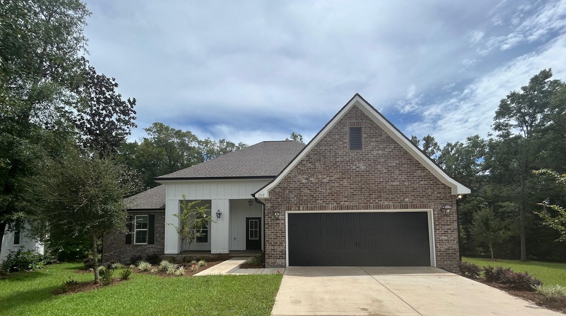 Located on a large, cul-de-sac lot the JOHNSON IV G in Harmony at Hammock Bay community offers a 4BR, 3BA, open design with separate dining room. Upgrades added (list attached). Features: double vanity, garden tub, separate custom tiled shower, and walk-in closet in master bath, walk-in closet in all other bedrooms, kitchen island, walk-in pantry, boot bench/drop zone in mudroom, covered porches, crown, recessed lighting, framed mirrors in all baths, smart connect WIFI thermostat, smoke and carbon monoxide detectors, landscaping package, architectural 30-year shingles, flood lights, and more! Energy Efficient Features: water heater, electric kitchen appliance package, vinyl low E windows, and more! Energy Star Partner.