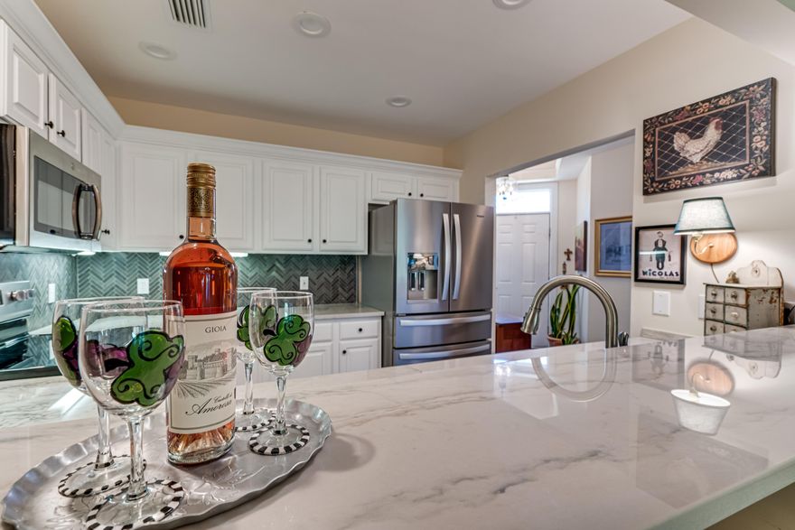 REDUCED- Perfect for Rental or Second home! Located on the Beach side of the Sandestin Golf & Beach Resort Tivoli Terrace is a short walk or golf cart ride to the beautiful beaches,restaurants and shopping. Beautifully updated kitchen to include, all stainless appliances, quartz countertops, refinished cabinets, updated fixtures, accent tiles and Luxury vinyl flooring that flows into the hallway, guest bath, closet and laundry room. Updated Carpeting on the stairs, upstairs landing and hallway. Very spacious floorplan with a Master suite downstairs and 2 additional large guest suites upstairs. Enjoy the peaceful courtyard from the screened in back patio or upstairs balcony steps away from the pool area.The full size two car garage is a must have, and comes complete with a 4-seater golf car