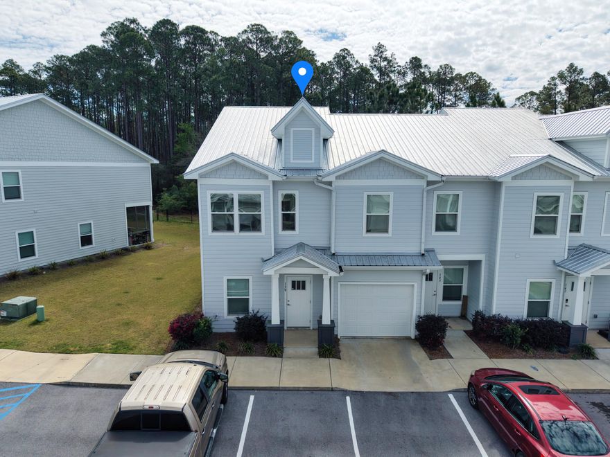 Welcome to 139 Date Palm Lane, located in the Verandas at Freeport community in Freeport. Built in 2023, this well-maintained two-story townhome offers approximately 1,500 square feet of living space with 3 bedrooms and 2.5 bathrooms. The home features a functional open-concept floor plan where the kitchen flows directly into the dining and living areas, creating an ideal layout for everyday living and entertaining. Large windows allow plenty of natural light to fill the main living space, giving the home a bright and welcoming feel.The kitchen is designed with both style and practicality in mind and includes quartz countertops, modern cabinetry, stainless steel appliances, and a spacious island with bar seating that provides additional prep space and a casual place to gather. The main floor also includes a convenient half bath and direct access to the back patio area, making it easy to step outside and enjoy the peaceful surroundings of the community.

Upstairs, the primary suite offers a comfortable retreat with a spacious bedroom, walk-in closet, and a private bathroom featuring dual vanities and a walk-in shower. Two additional bedrooms provide flexibility for guests, family members, or a home office, while the second full bathroom is centrally located for convenience. The upstairs layout offers a practical separation between the main living area and the sleeping quarters.

As part of the Verandas community, residents enjoy neighborhood amenities including a community pool, pickleball courts, and a playground, all designed to enhance the neighborhood lifestyle. The location offers quick access to local schools, grocery stores, and shopping throughout Freeport while still being within a short drive of the white sand beaches and coastal communities along 30A and the scenic shoreline of Choctawhatchee Bay.

139 Date Palm Lane presents an excellent opportunity to own a newer construction home in one of the Emerald Coast's fastest-growing areas, offering modern finishes, low-maintenance living, and a convenient location close to both everyday amenities and the beautiful Gulf Coast beaches.