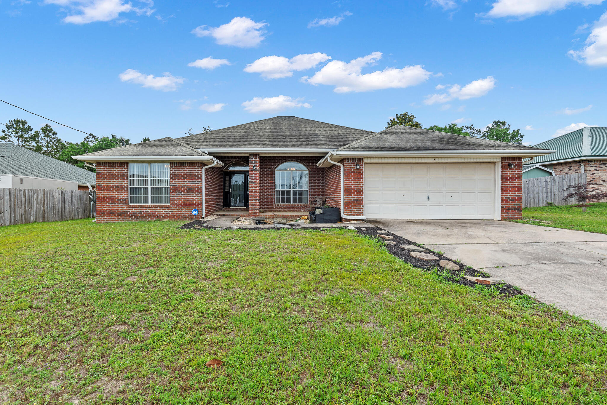 New Roof w/ Architectural Shingles to be installed with acceptable offer!  Take a look at this all brick, 4 bedroom, 2 bath home w/ koi pond in the peaceful Foxwood neighborhood located in South Crestview.  House and koi pond are ready for a new owner to make them their own.Golfers - the all new Blackwater Golf Club, formerly Foxwood Country Club, has a 18-hole championship course w/ a state-of-the-art driving range and it's right down the street!