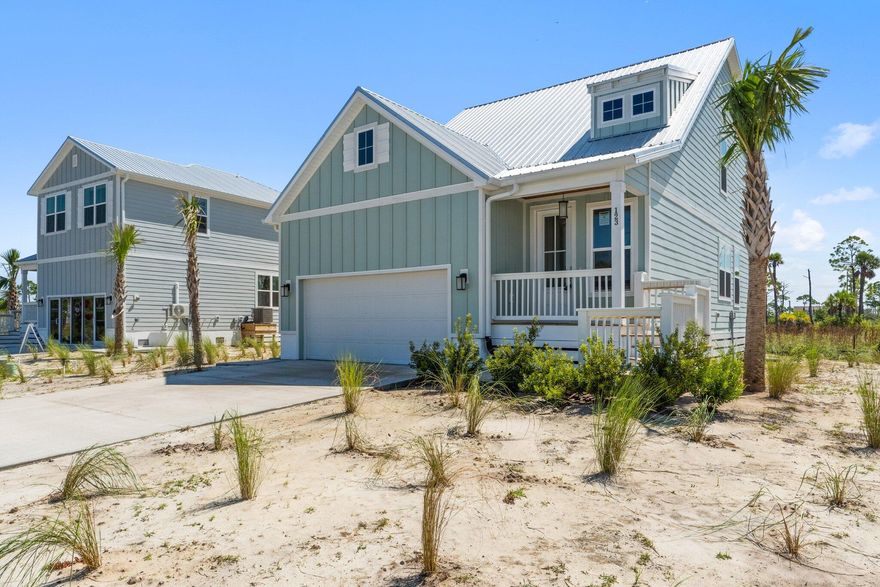 Welcome to Islamorada floor plan at 123 Marsh View Ridge Lane, a bright and beautiful home located at the front of the community. This home features beautiful white cabinetry and quartz countertops, stainless steel appliances, and engineered vinyl plank flooring. When you walk inside the Islamorada, you will find matching quartz countertops in the kitchen and bathrooms, as well as exquisitely crafted cabinets throughout the home. Engineered vinyl plank flooring throughout the home which will give you the appearance of wood yet allow you to enjoy the low maintenance qualities of being water and scratch resistant. The stairs are made of beautiful oak treads leading to the spacious upstairs area. In the kitchen you will find a gorgeous herringbone back splash to compliment the quartz countertops that have been selected for your home. Each home comes with a Whirlpool appliance package with stainless-steel dishwasher, microwave and electric range, Moen brushed nickel fixtures with pull out faucet in the kitchen. Exterior features include and are not limited to Color Plus Hardie Plank Siding, covered back patio (per plan), metal Roof, 8-foot raised glass prairie door with designer brushed nickel hardware, 8-foot full glass back door, full house gutters, impact glass windows, crown molding (per plan). Each home is a Smart Home that offers you energy efficiency, the convenience of being able to monitor the temperature in the home, operate lights and keyless entry, Skybell doorbell enabling you to see and speak to someone who is at your front door whether you are there or not and also have the ability to open and close your garage door and unlock your front door remotely. We are only building 12 homes in Redfish Cove. Imagine waking up in the morning and being able to sit on your porch and being able to take in the serenity of a new beginning with a beautiful sunrise on the St. Joseph Bay while you contemplate kayaking or paddle boarding