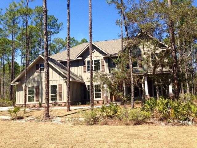 Home reduced $27,250!!!Large lot. Backs up to nature preserve land. Just walking distance from the bay and a few miles from the Beach, Point Washington Estates is located in a terrific area. Fishermen, boat ramps are near and you have room to expand. Point Washington Estates was formerly platted as The Woods Phase II. Land designated as state forest surrounds Point Washington Estates. Therefore, the community is the only community/homes on the south side of East Point Washington Rd. The community consists of only 21 homes sites that range from .58 acres to 1 acre. Each site is unique and home to large mature Oaks, Magnolias, and Pines. Large sites that allow for additional structures are perfect for home owners who desire space, privacy, and the ability to expand