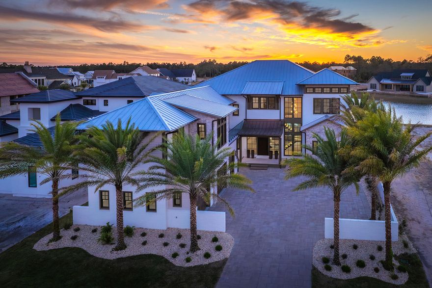 Now complete, brand new, and move-in ready, 75 N Southern Cross Lane presents an exceptional opportunity in Watersound Camp Creek--strategically repositioned at $5,995,000 for immediate consideration. Encompassing nearly 7,000 square feet, this newly delivered residence offers a rare combination of scale, finish quality, and resort-style living within one of 30A's most exclusive gated communities. Thoughtfully designed with dual primary suites, soaring beamed ceilings, and a seamless blend of luxury and functionality, the home is ready for immediate enjoyment without the wait of new construction. This refined offering reflects today's market while delivering a level of craftsmanship, amenities, and lifestyle value that stands apart. Inside, every space has been curated for elevated everyday living and effortless entertaining. A full chef's kitchen is complemented by a discreet service kitchen, while two laundry rooms, an in-home elevator, and a 2.5-car garage enhance convenience. Dedicated spaces include an executive office, fully equipped home gym, state-of-the-art theater, and expansive game room with wet bar. The private wellness suite rivals a luxury spa, featuring a steam room, dry sauna, cold plunge, and dedicated showeran unmatched retreat within the home.

Outdoors, a private backyard oasis unfolds with a resort-style pool, spa, and full outdoor kitchen overlooking a tranquil pond, creating an ideal setting for relaxation and entertaining alike. Guests enjoy complete privacy in the carriage house above the garage, complete with its own entrance and full kitchen. The home's coastal architecture is elevated by natural stone accents, a grand auto court, and striking curb appeal throughout.

Ownership in Watersound Camp Creek extends far beyond the home itself. Residents may access exclusive Watersound Club membership opportunities, offering private beach access with chair and towel service, a multi-pool campus with lazy river, championship golf across multiple courses, world-class fitness and wellness facilities, tennis and pickleball, and premier dining and spa experiences at Camp Creek Inn, The Pearl, and WaterColor Inn.

With only 263 homesites, Watersound Camp Creek remains one of the most limited and coveted communities on the Gulf Coast. 75 N Southern Cross Lane delivers a rare opportunity to secure a fully completed, legacy-caliber residenceoffering immediate occupancy, exceptional value, and a lifestyle that is simply unmatched along 30A.