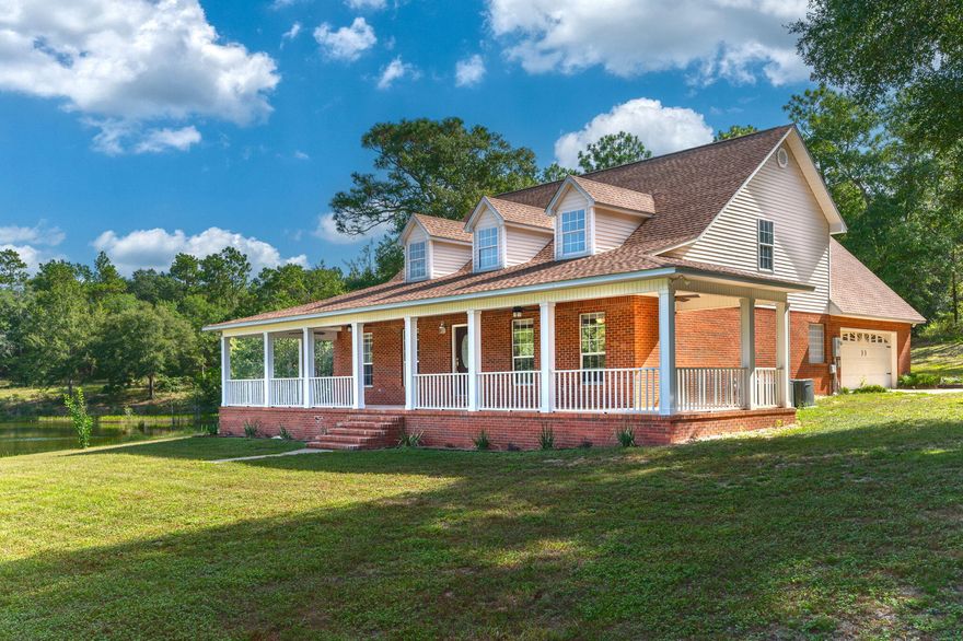 Professional photos coming soon. Almost 2700 square feet. Brand New Paint, New Laminate, New Carpet, New Water Heater, 4 year old roof. 4 bedroom, 2.5 bath, plus an office. Gorgeous wrap around porches. Living room, Dining Room and Office, and Master Bedroom all have lake front views.Utilities are serviced by Auburn Water and Chelco.