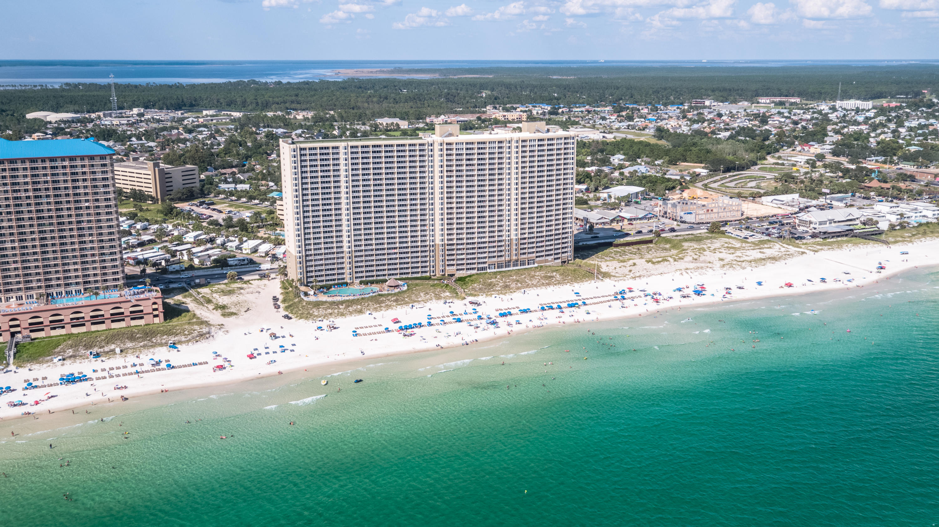 Gulf Front 1BR/1BA Condo with bunks in Beautiful Emerald Beach. Spacious living room & kitchen. Custom cabinets, granite counter tops and backsplash. Sliding Glass doors and Floor to ceiling windows to the balcony overlooking the World's Most Beautiful White Sand Beaches & Emerald Coastline. Emerald Beach is a fabulous, very clean complex with a full-service Starbucks, retail store, sky walk bar with karaoke, burgers & ice cream, large gym & garage parking. Just a few short minutes to Pier Park Shopping, Fine Dining & Entertainment. Don't miss out on this one!